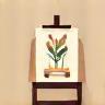 Easel and paint brush icon representing craft workshops.